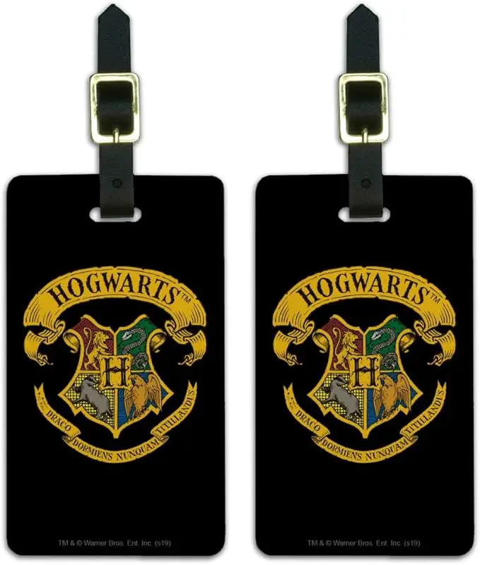 black luggage tags with the Hogwarts crest